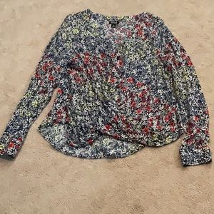 A.n.a woman’s navy blouse. Long sleeves, size medium. Longer in the back.